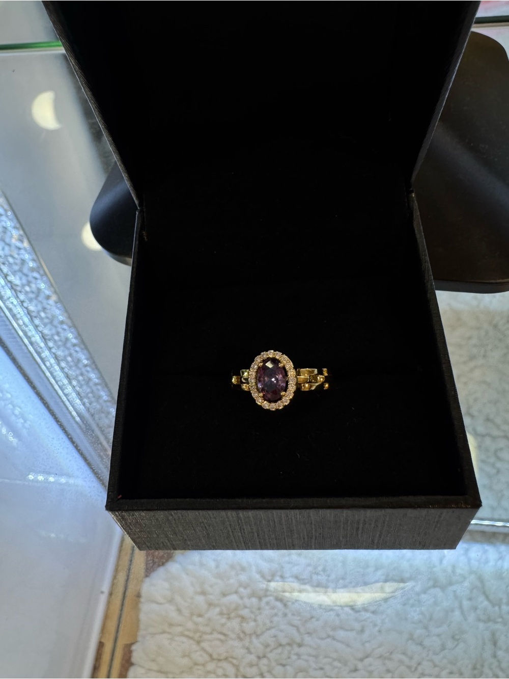 Gold-Plated Ring with Purple Oval Stone and Halo